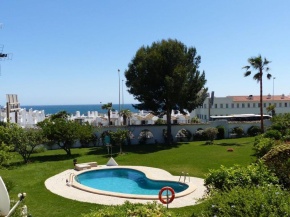 Apartment, 2 bedrooms, on the beach, with pool, sea views and garden -- All included, Parking Wifi and Netflix
