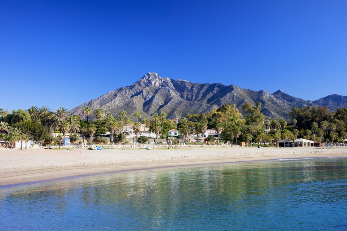 'Marbella sandy beach, summer holiday scenery by the Mediterranean Sea in Spain, Andalusia region, Costa del Sol, Malaga province.' - Andalusia