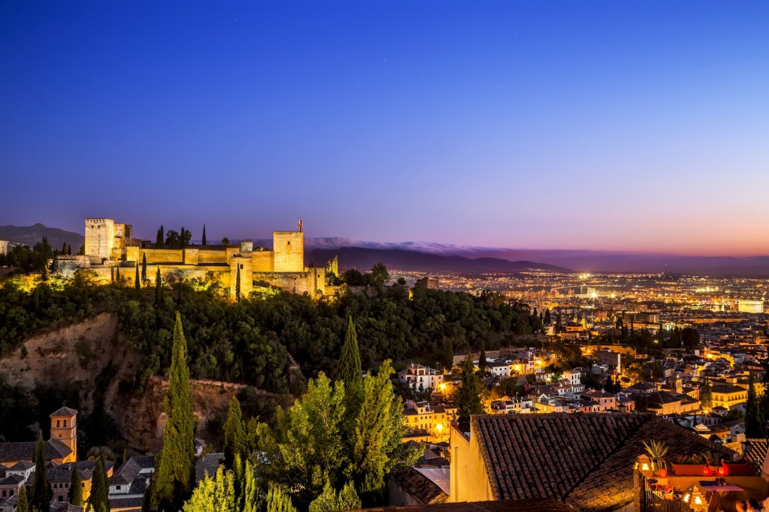 Ancient arabic fortress of Alhambra at night. Granada, Spain.