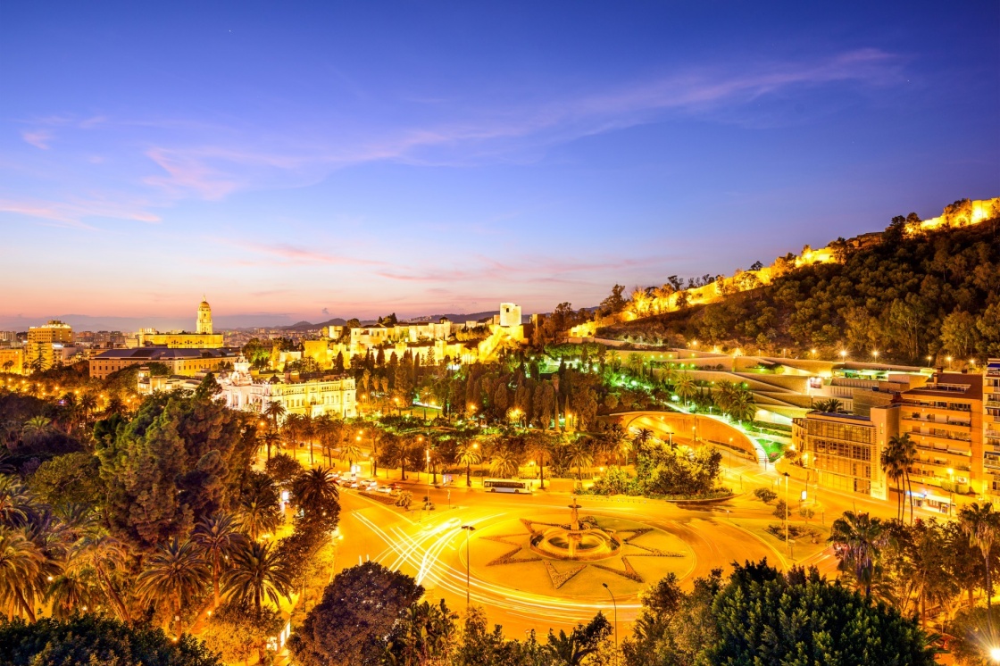 Malaga, Spain cityscape at the Cathedral, City Hall and Alcazaba Moorish fort.